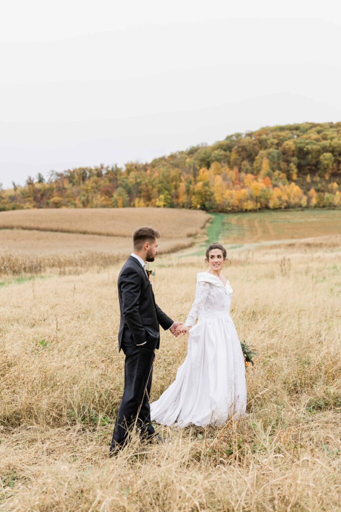 Beautiful fall wedding in Pepin Wisconsin at Hidden Meadow and Barn. Fall colors everywhere. 