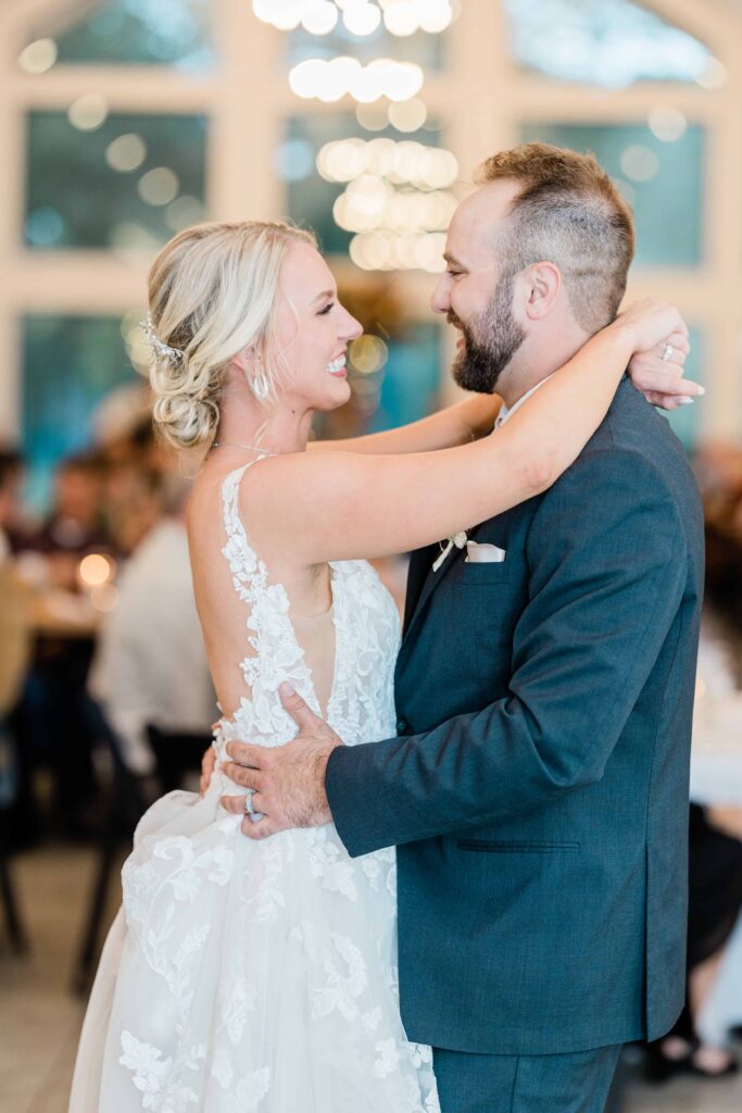 Casey and Jordan dancing together at their wedding day. The bride and groom's first dance was beautiful at La Pointe Events Somerset Wisconsin. 