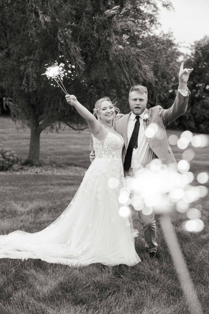Husband and sparkler photos at Ridgetop, Prescott Wisconsin. Photo captured by professional wedding photographer Isa Wines Photography 