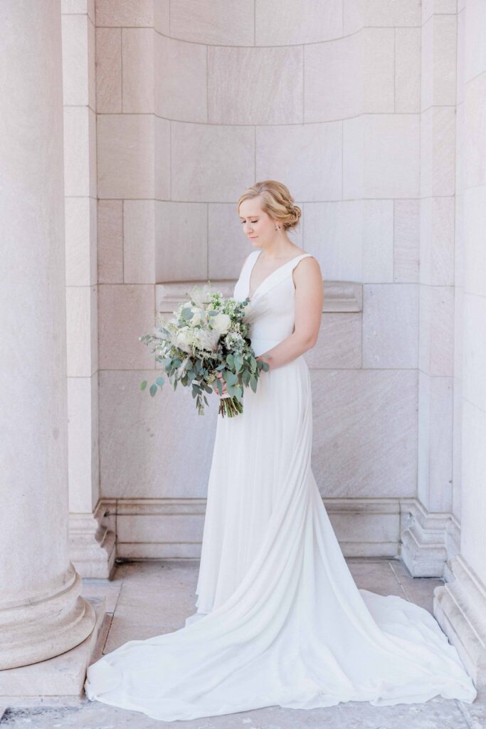 This is a portrait of the bride, Tenley at the James J Hill Library. 
Gorgeous Fall wedding at the Intercontinental Hotel in Saint Paul, Minnesota. 