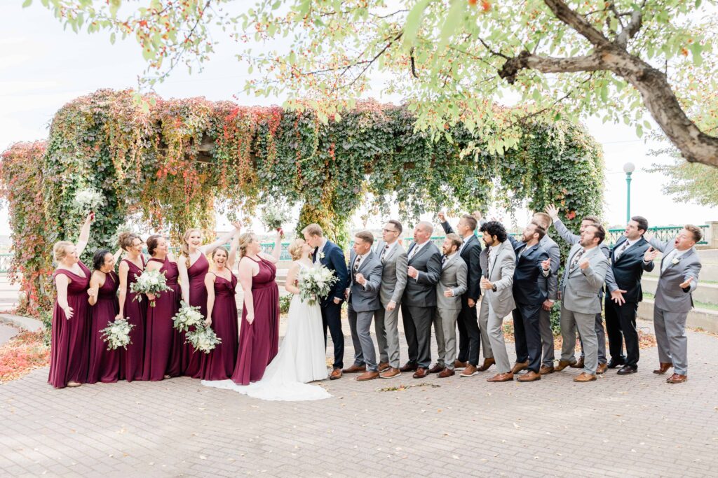 Gorgeous Fall wedding at the Intercontinental Hotel in Saint Paul, Minnesota. This is a portrait of the bride and groom and their bridal party. 