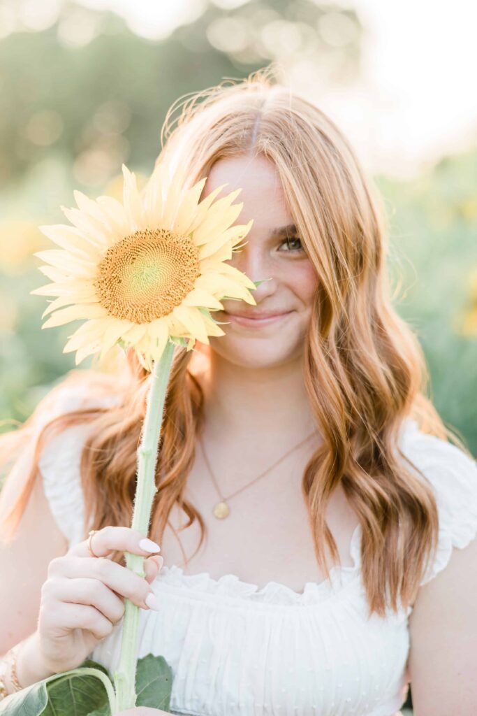 Gorgeous sunflower filed senior session portrait. Minneapolis Photographer 